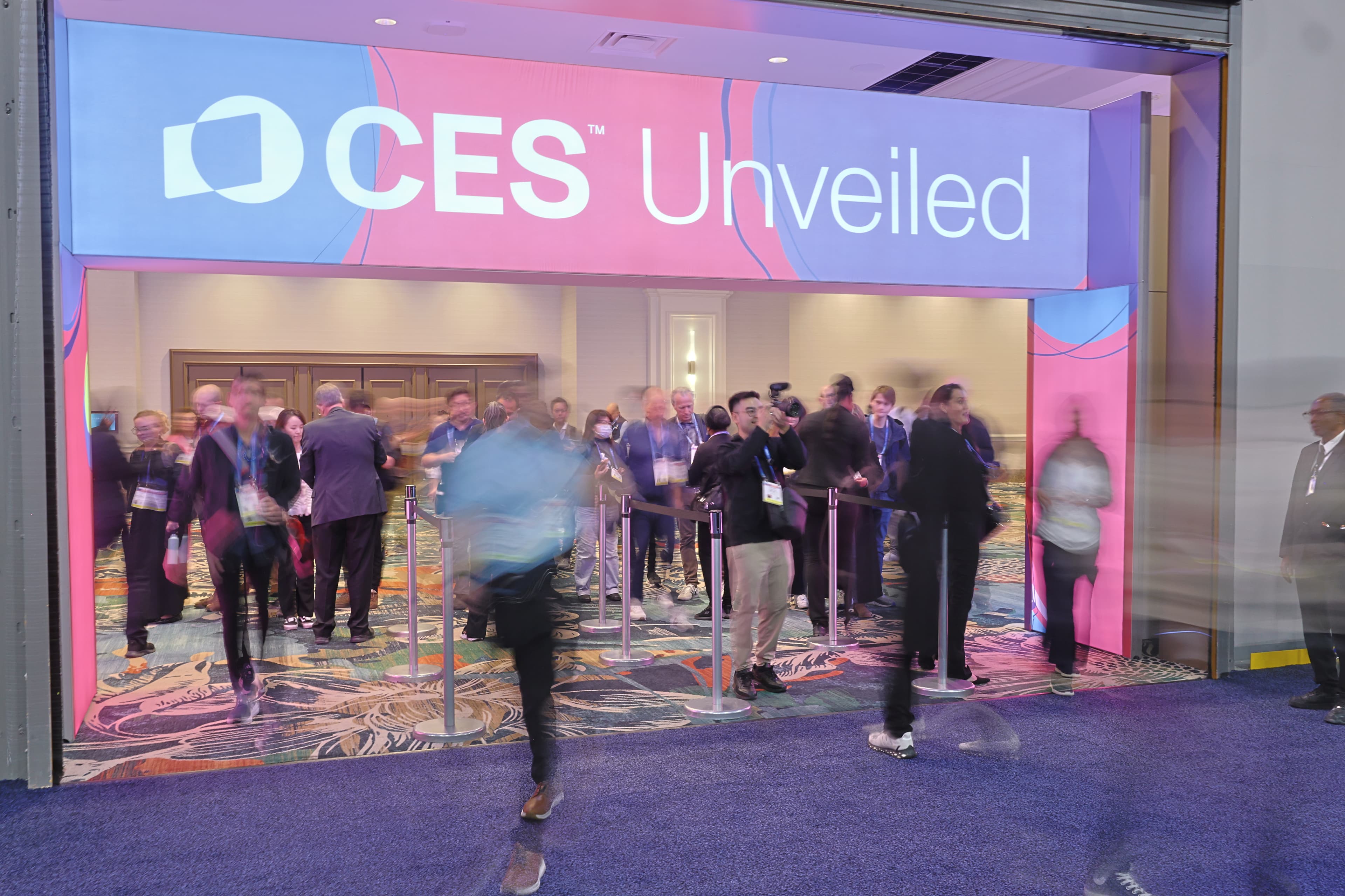 The illuminated CES Unveiled entrance welcomes attendees